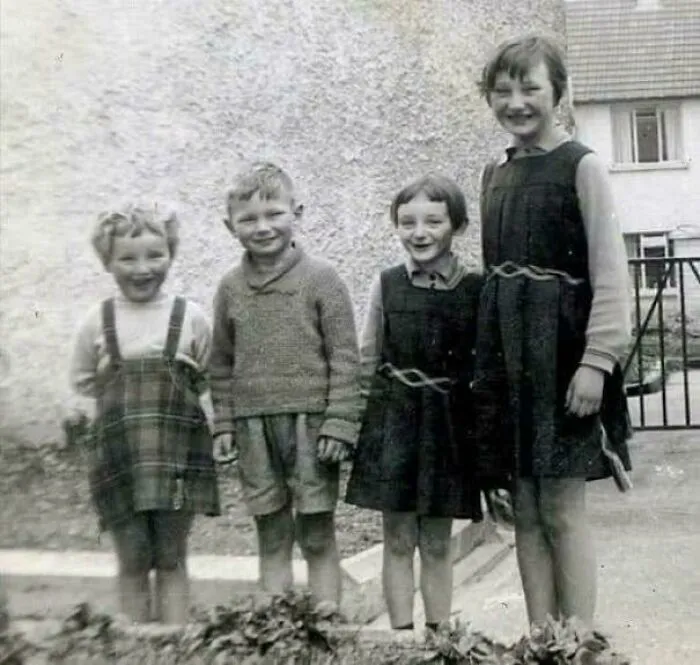 Young Liam Neeson with his sisters, 1960 | childhood photo
