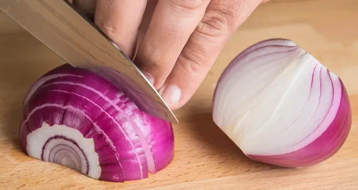 Why does cutting an onion make your eyes burn?