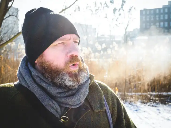 Why does the human voice change in cold weather